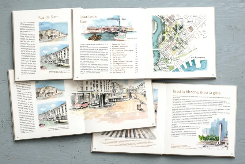 Pages int&eacute;rieures ouvertes d'un livre d'art illustr&eacute; pr&eacute;sentant des aquarelles et cartes de la ville de Brest sur fond gris