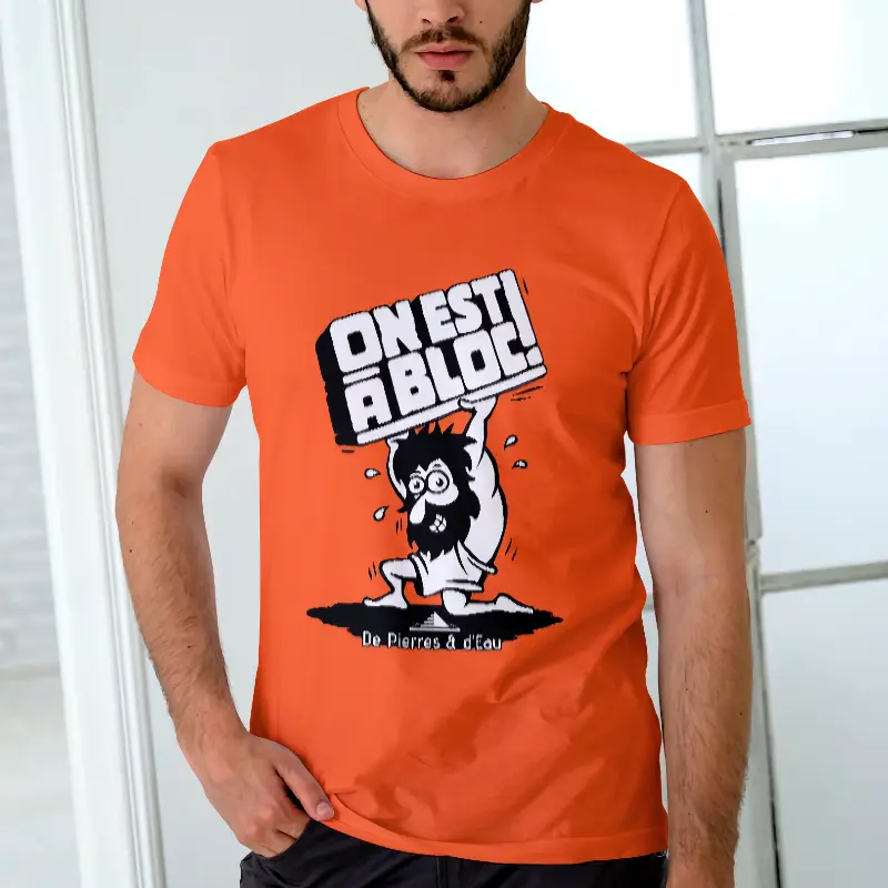 T-shirt orange port&eacute; avec illustration et texte ON EST &Agrave; BLOC !